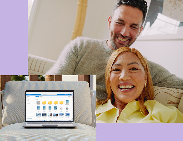 Un uomo e una donna guardano lo schermo di Microsoft 365 su un laptop PCSpecialist